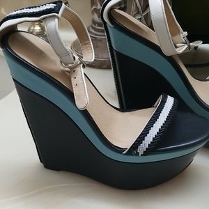 LAMB by Gwen Stefani.  Platform heels.